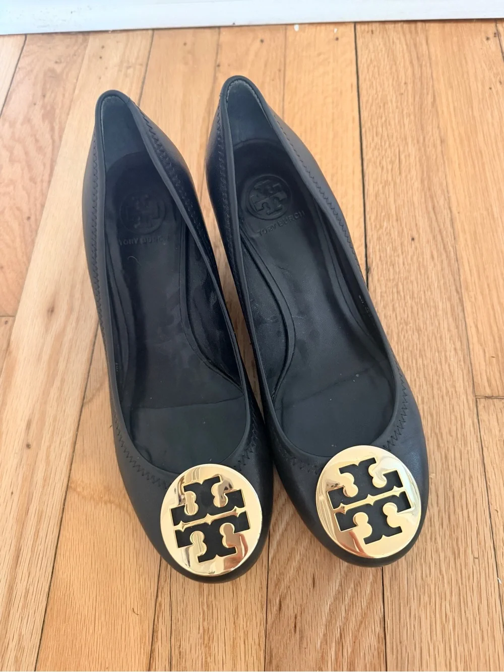 Tory Burch Black Leather Wedges with Gold Logo Medallions